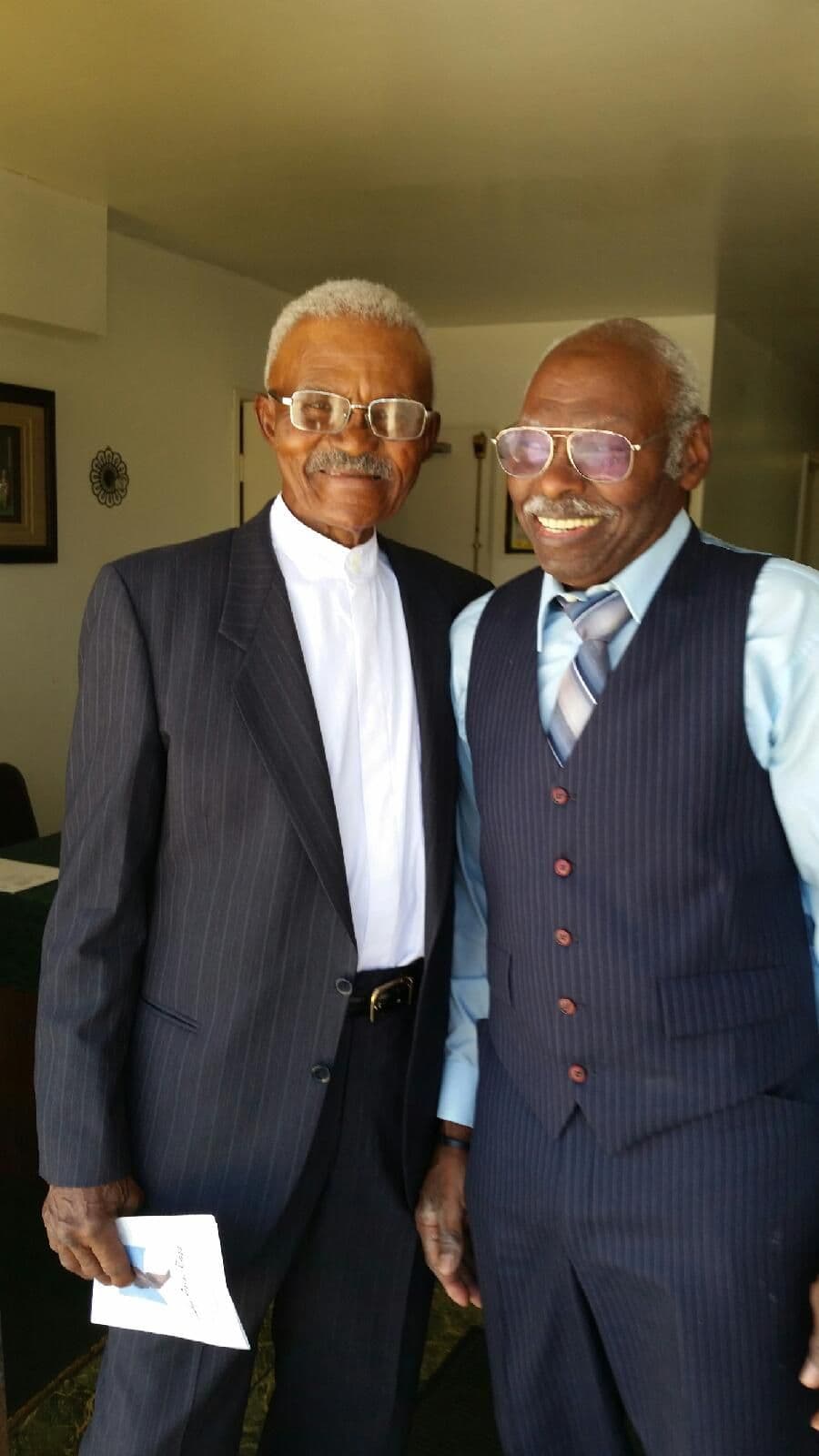A mentor and mentee in conversation at Sovereign Man Academy